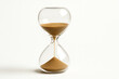 © Alex - A close-up of a classic glass hourglass filled with fine sand. This timeless symbol represents the passage of time, patience, and the importance of managing one's time wisely.