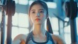 © yoga - Young woman working out in a gym