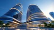 © Vangly - Modern high-rise buildings with sleek architecture illuminated at dusk.