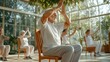 © Adex - Seniors practicing chair yoga wellness and healthy aging