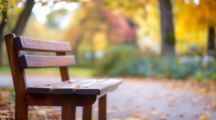 Poster - Empty wooden park bench in autumn setting, surrounded by blurred yellow and orange leaves.  A peaceful scene of fall foliage and quiet contemplation. : Generative AI