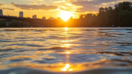 Poster - Golden sunset reflected on calm water surface near a city skyline, creating a serene and peaceful atmosphere. The sun's rays illuminate the water with warm, shimmering light. : Generative AI