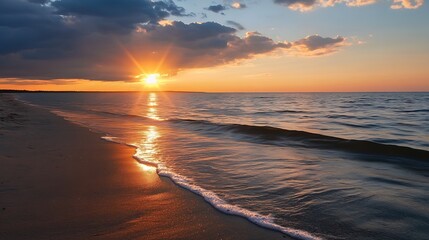 Aufkleber - Serene sunset over calm ocean waves gently lapping a sandy beach, showcasing a vibrant orange and blue sky with fluffy clouds. : Generative AI