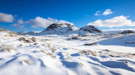 Aufkleber - Stunning winter landscape showcasing snow-covered mountains under a vibrant blue sky, with subtle clouds adding depth to the scene.  The foreground reveals textured snow drifts and har : Generative AI