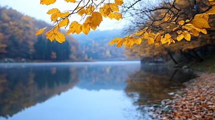 Poster - Serene autumn scene: golden leaves on a branch gently overhanging a calm lake, reflecting the misty hills and colorful foliage. : Generative AI