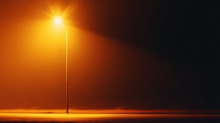Wall Mural - a solitary streetlamp illuminates a foggy night, casting an orange glow over the empty street