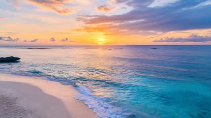 Aufkleber - Serene sunset over tranquil ocean waves gently lapping a pristine sandy beach, creating a picturesque tropical seascape. : Generative AI