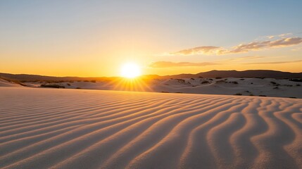 Poster - Sunset over undulating white sand dunes, creating a warm, textured landscape with the sun's rays casting long shadows across the rippled surface. : Generative AI