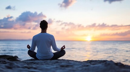 Aufkleber - Serene man meditating in lotus pose on coastal rocks during a breathtaking sunset, enjoying peaceful ocean view and vibrant sky colors. : Generative AI