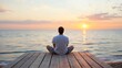 © Generative AI - Man meditates in lotus position on wooden dock at sunset, ocean view, peaceful serene moment of contemplation and relaxation. : Generative AI