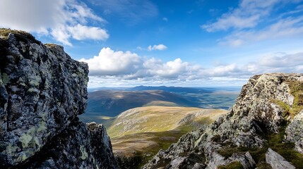 Aufkleber - Majestic mountain vista: a breathtaking panoramic view from a rocky peak, showcasing a vast expanse of rolling hills, valleys, and a clear blue sky dotted with fluffy white clouds. : Generative AI