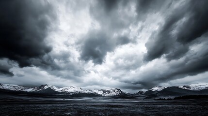Poster - Dramatic monochrome landscape featuring snow-capped mountains under a brooding, dark sky, conveying a sense of atmospheric tension and vastness. : Generative AI