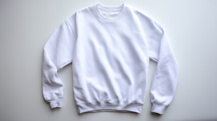 Poster - This composition features a crewneck sweatshirt displayed flat, slightly folded sleeves creating an inviting look. The clean background enhances the sweatshirt’s details