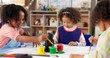 © CineLens25/peopleimages.com - Learning, children and painting in class for art, creative talent and development in preschool. Education, students drawing and kids with watercolor for growth, artwork and sketch on paper with brush