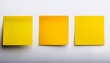 © Taylor - three yellow sticky notes on white background blank paper planning or reminder concept