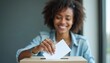 © miss irine - Woman casts vote into ballot box. Smiling female with ballot paper, expressing participation in election. Democracy concept, voting day with ballot, civic duty.