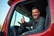 © Yuliia - Truck Driver Thumbs Up from Behind the Wheel
