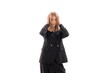 © Svetlana - Model poses dramatically indoors with hands on head, showcasing fashion and emotion during a styled photoshoot