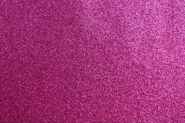 A pink background with a lot of small dots