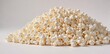 © tpadobestock - A mound of fluffy popcorn against a pure white backdrop , light, airy, kernel