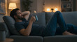 © Gustavo - A man lying on a couch with a cup of coffee and ambient music playing in the background