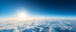 © Jamal - Scenic aerial view of sunlight over layered clouds stretching to horizon