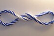 © LesaMurina Coll - A blue and white twisted infinity loop is presented on a plain, neutral background