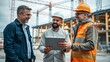 © Views & Backgrounds - Three construction professionals review project plans on a tablet at a modern building site with cranes in the background.