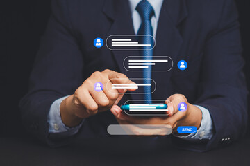 Wall Mural - businessman texting on smartphone with floating chat bubbles, concept of mobile communication.