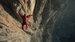 © Sekai - High-Flying Base Jumper in Red Suit Leaping into the Unknown for Extreme Sports and Adventure Fans