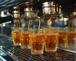 © bismillah - Espresso shots pouring into glasses