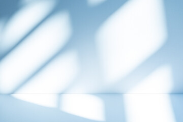 Fototapete - Wall interior background, studio and backdrops show products. with soft light shadow from window color blue and white. background for text insertion and presentation of product	