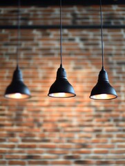 Poster - Three pendant lights illuminate a brick wall creating a warm and inviting atmosphere in interior design modern style
