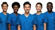© 5 Grace Media - Smiling healthcare professionals stand proudly in matching blue scrubs against a white backdrop