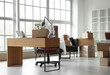 © Pixel-Shot - Workplace with cardboard boxes in office on moving day