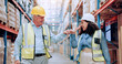 © Jessy25/peopleimages.com - Man, woman and fist bump for logistics at warehouse, smile and success with motivation, team and support. People, mentor and happy with respect, celebration and goal for supply chain at storage plant