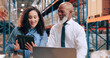 © Jessy25/peopleimages.com - Distribution, people or teamwork in warehouse, tablet or online schedule for supply chain. Employees, logistics or meeting with smile, stock or tech for email, quality control or inventory management
