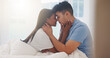 © peopleimages.com - Couple, forehead touch and love in bedroom together, affection and bonding with commitment for trust at home. Romance, partner and security in healthy relationship, calm and interracial people in bed