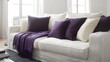 © RABBI - Elegant Off-White Sofa with Purple Throw and Pillows
