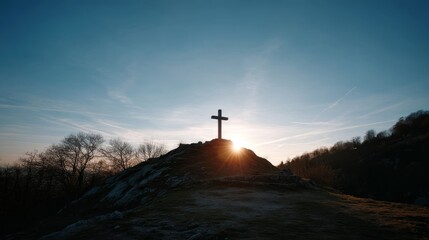 Aufkleber - A cross stands tall on a small hill, framed by a vibrant sunset sky that casts warm colors, creating a serene and peaceful ambiance at dusk