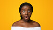 © Prostock-studio - No way. Closeup portrait of shocked young african american woman opened mouth in amazement, emotionally reacting to news, standing over yellow studio background and looking at camera, free space.