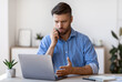 © Prostock-studio - Worried Male Entrepreneur Having Problems With Laptop Computer At Work, Talking With Customer Support On Cellphone, Concerned Man Suffering Bad Internet Connection At Workplace In Office, Free Space