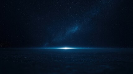 Wall Mural - A starry night sky with a glowing horizon and a serene, dark foreground, evoking a sense of space and infinity.