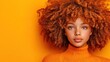 © afridwi - Vibrant portrait young woman curly orange hair turtleneck sweater orange background