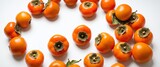 Fresh kaki persimmon fruits on white.