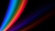 © Cynthia - Colorful light beam streak across black background.