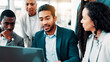 © peopleimages.com - Business, people and meeting at laptop for planning, campaign management or project feedback in office. Company team, man leader or discussion at tech for brainstorming, online presentation or advice