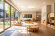 © Moritz - Bright and spacious kindergarten room with toys, tables, and natural light, creating a welcoming and stimulating environment for children's learning and play