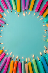 Leinwandbilder - Vibrant blue background with a festive border of colorful burning candles, perfect for adding a celebratory touch