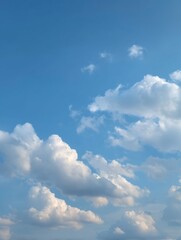 Fototapete - Soft White Clouds Drift Gracefully Across a Serene Pastel Blue Sky During a Bright Summer Day Generative AI